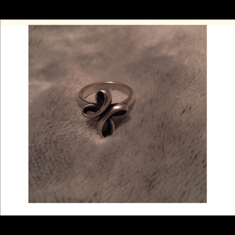 Silver crossed ribbon ring